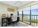 Home office featuring an exterior view and natural light; the perfect spot to work while enjoying waterfront scenery at 1591 Beach Rd # 403, Englewood, FL 34223