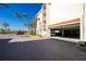 View of the building parking garage beneath the building at 1591 Beach Rd # 403, Englewood, FL 34223