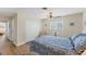 View of main bedroom featuring a bed, closet, and a hardwood floor at 1710 Loralin Dr, Englewood, FL 34223