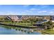 Waterfront community featuring docks, a park, and views of the lake at 17728 Silverspur Dr, Punta Gorda, FL 33982