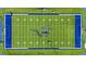 A bird's-eye view shows a football field with a large logo, yard lines, and track at 17728 Silverspur Dr, Punta Gorda, FL 33982