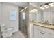 Beautiful full bathroom showcasing a walk-in shower and modern vanity at 1906 Mississippi Ave, Englewood, FL 34224