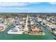 Stunning aerial view of waterfront homes on canals, offering serene coastal living with easy access to the open water at 1922 Michigan Ave, Englewood, FL 34224