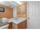 Bathroom featuring a white sink and decorative starfish accent at 2255 N Beach Rd # 12, Englewood, FL 34223