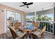 Relaxing screened balcony with outdoor seating at 2375 N Beach Rd # 2B, Englewood, FL 34223