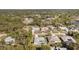 Aerial view of residential area featuring homes with pools and ponds at 2657 Tusket Ave, North Port, FL 34286