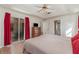 Spacious primary bedroom features tray ceiling, sliding doors to lanai and ensuite bathroom at 2657 Tusket Ave, North Port, FL 34286