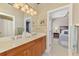 Bathroom featuring a double vanity with ample counter space and a large mirror at 2660 Sable Palm Way, Port Charlotte, FL 33953