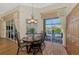 Cozy breakfast nook with backyard and pool views at 2660 Sable Palm Way, Port Charlotte, FL 33953