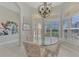 Charming breakfast nook featuring a glass table and chairs with bright natural light at 3307 Osprey Ln, Port Charlotte, FL 33953