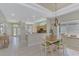 Bright dining area with tiled flooring and stylish chandelier near the kitchen at 3307 Osprey Ln, Port Charlotte, FL 33953