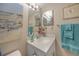 Clean bathroom with vanity and mirror at 404 Cerromar N Cir # 112, Venice, FL 34293