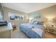 Spacious bedroom with king-size bed and view at 404 Cerromar N Cir # 112, Venice, FL 34293