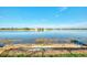 Expansive lake view highlighting the calm water, distant shoreline, and the open sky above at 43 Blue Hen Dr, Placida, FL 33946