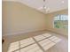 Bright living room featuring tile flooring, a large window, and natural lighting at 43 Blue Hen Dr, Placida, FL 33946