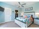 Bedroom with coastal decor and a ceiling fan at 5 Pointe Way, Placida, FL 33946