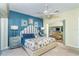 Main bedroom with water views and a coastal themed decor at 5 Pointe Way, Placida, FL 33946