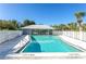 Inviting community pool with covered seating area at 5 Pointe Way, Placida, FL 33946