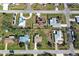 Aerial view of property showcasing its prime location within a quiet neighborhood and proximity to local amenities at 5031 Lucine Rd, Venice, FL 34293