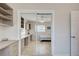 Bedroom closet featuring mirrored doors revealing neutral paint and tiled floors at 5031 Lucine Rd, Venice, FL 34293