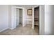 Spacious walk-in closet featuring built-in shelving and desk with decorative artwork at 5031 Lucine Rd, Venice, FL 34293