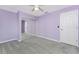 Bedroom with soft carpet, neutral-toned walls, and a mirrored closet at 525 Foxwood Blvd, Englewood, FL 34223