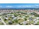 Aerial view of a quaint neighborhood along the water with views of the ocean at 621 Tarpon Way, Punta Gorda, FL 33950