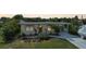 House exterior at dusk, showing landscaping and driveway at 621 Tarpon Way, Punta Gorda, FL 33950