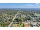 Neighborhood aerial view featuring tree lined streets and water views at 681 Olive St, Englewood, FL 34223