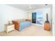 Comfortable bedroom featuring serene ocean views and a private balcony at 7482 Palm Island Dr # 2522, Placida, FL 33946