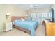 Serene bedroom with large window offering stunning views of the ocean at 7482 Palm Island Dr # 2522, Placida, FL 33946