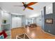 Bright foyer featuring hardwood floors, natural light, and neutral paint colors at 803 Diane Cir, Englewood, FL 34223