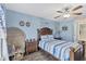 Bedroom featuring a ceiling fan and wood flooring at 8205 Chico St, Port Charlotte, FL 33981