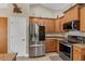 Well-equipped kitchen featuring stainless steel appliances and granite countertops at 8205 Chico St, Port Charlotte, FL 33981