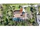 Aerial view of home featuring a screened pool and inviting outdoor space at 955 Morrison Ave, Englewood, FL 34223