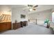 Loft featuring carpeted floors and a convenient wet bar area at 955 Morrison Ave, Englewood, FL 34223