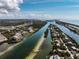 Stunning aerial view of a coastal community featuring waterfront homes and condos with boat access at 11120 Hacienda Del Mar Blvd # F-301, Placida, FL 33946