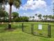 Outdoor dog park featuring lush greenery and secure fencing for a safe and fun environment at 11120 Hacienda Del Mar Blvd # F-301, Placida, FL 33946