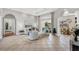 Bright and airy living room with tile flooring, neutral colors, and stylish furnishings at 15 Boca Royale Blvd, Englewood, FL 34223