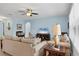 Comfortable living room with ample seating and plenty of natural light at 15081 Aldama Cir, Port Charlotte, FL 33981
