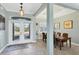 Bright and airy entryway with tiled floors, recessed lighting, and a clear view into the dining area at 15610 Seafoam Cir, Port Charlotte, FL 33981