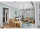 Cozy living room with natural light, comfortable seating, and decorative accents at 15610 Seafoam Cir, Port Charlotte, FL 33981