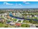 Wide aerial view of a residential community highlighting waterway access at 170 Long Meadow Ln, Rotonda West, FL 33947