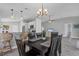 View of dining room connected to the breakfast bar area and living room space at 170 Long Meadow Ln, Rotonda West, FL 33947