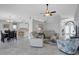 Open-concept living area with views of the kitchen and front entryway at 170 Long Meadow Ln, Rotonda West, FL 33947