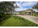 Covered picnic area with multiple tables for outdoor dining and gatherings at 170 Long Meadow Ln, Rotonda West, FL 33947