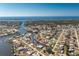 Aerial view of waterfront home with access to open water at 1910 Greenlawn Dr, Englewood, FL 34223