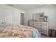 Bedroom featuring a bed, dresser, and two closets at 23 Fairway Rd, Rotonda West, FL 33947