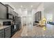 Granite countertops and stainless steel appliances in the kitchen at 23 Fairway Rd, Rotonda West, FL 33947