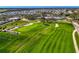 Expansive green golf course with sand traps and manicured fairways offers a challenging yet enjoyable experience at 26636 Irwin Dr, Englewood, FL 34223